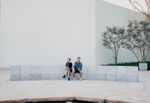 In Full Sunlight by James Tissot, garden in London with artists’ companions